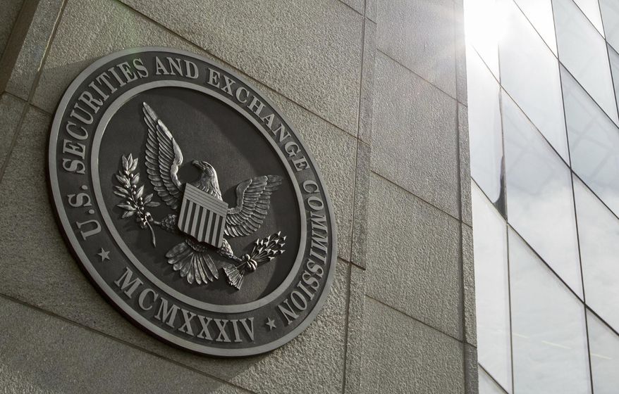 The seal of the U.S. Securities and Exchange Commission is seen at SEC headquarters, June 19, 2015, in Washington. (AP Photo/Andrew Harnik, File)