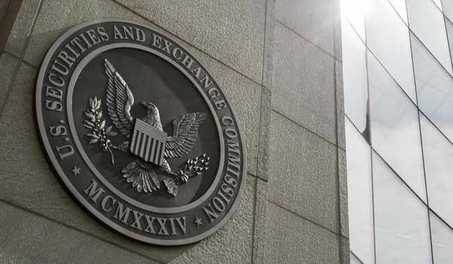 The seal of the U.S. Securities and Exchange Commission is seen at SEC headquarters, June 19, 2015, in Washington. An auditing firm hired by Trump Media and Technology Group just 37 days ago was busted by the Securities and Exchange Commission for “massive fraud” — though not for any work it performed for former President Donald Trump’s media company. (AP Photo/Andrew Harnik, File)