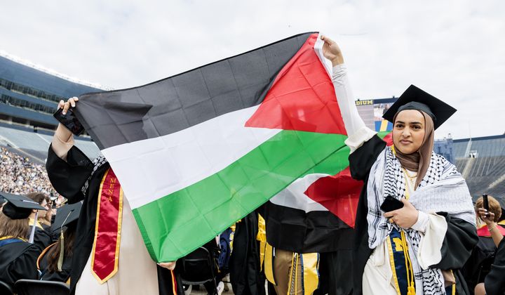 Pro-Palestinian protesters demonstrate during the University of Michigan&#x27;s Spring 2024 Commencement Ceremony at Michigan Stadium in Ann Arbor, Mich., on Saturday, May 4, 2024.( Jacob Hamilton/Ann Arbor News via AP)