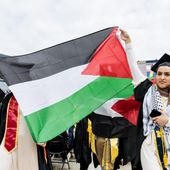 Pro-Palestinian protesters demonstrate during the University of Michigan&#x27;s Spring 2024 Commencement Ceremony at Michigan Stadium in Ann Arbor, Mich., on Saturday, May 4, 2024.( Jacob Hamilton/Ann Arbor News via AP)
