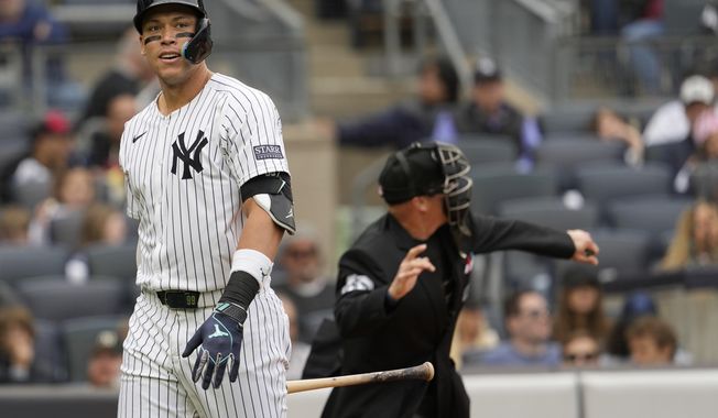 Homeplate umpire Ryan Blakney, right, ejects New York Yankees&#x27; Aaron Judge, left, from the game in the seventh inning of a baseball game against the Detroit Tigers, Saturday, May 4, 2024, in New York. (AP Photo/Mary Altaffer)