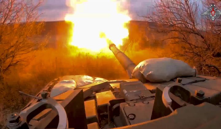 In this photo released by the Russian Defense Ministry on March 19, 2024, a Russian tank fires at Ukrainian troops from a position near the border with Ukraine in Russia’s Belgorod region. (Russian Defense Ministry Press Service via AP, File)