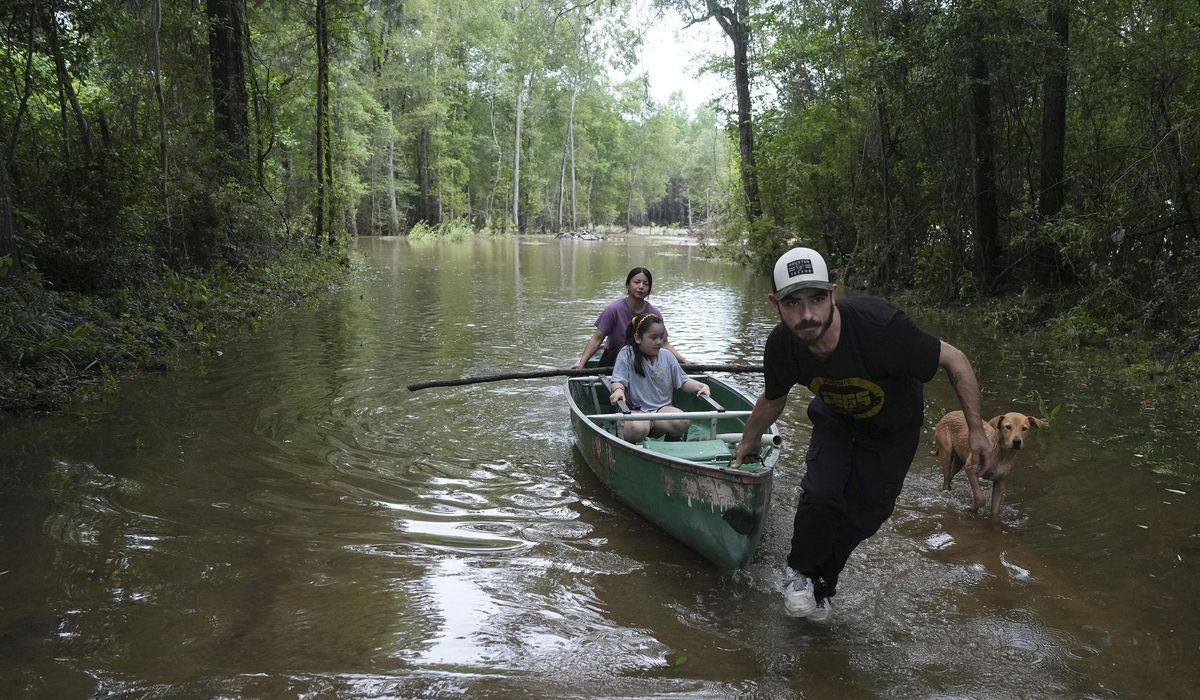 NextImg:Heavy rains ease around Houston, but flooding remains after hundreds of rescues and evacuations