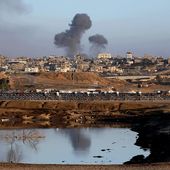 Smoke rises following an Israeli airstrike on buildings near the separating wall between Egypt and Rafah, southern Gaza Strip, Monday, May 6, 2024. (AP Photo/Ramez Habboub)