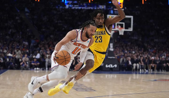 New York Knicks&#x27; Jalen Brunson (11) drives past Indiana Pacers&#x27; Aaron Nesmith (23) during the first half of Game 1 in an NBA basketball second-round playoff series, Monday, May 6, 2024, in New York. (AP Photo/Frank Franklin II)