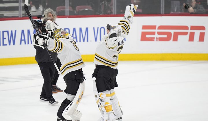Boston Bruins goaltenders Jeremy Swayman, left, Linus Ullmark celebrate after the Bruins beat the Florida Panthers 5-1 in Game 1 of the second-round series of the Stanley Cup Playoffs, Monday, May 6, 2024, in Sunrise, Fla. (AP Photo/Wilfredo Lee) **FILE**