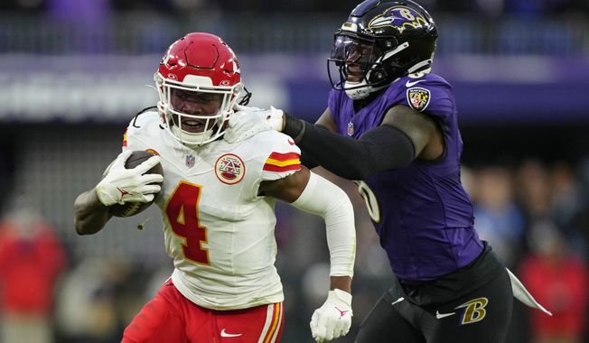 Kansas City Chiefs wide receiver Rashee Rice (4) is tackled by Baltimore Ravens linebacker Patrick Queen (6) during the first half of the AFC Championship NFL football game, Jan. 28, 2024, in Baltimore. Kansas City Chiefs receiver Rashee Rice is suspected of assault in Dallas a little over a month after he was one of the speeding drivers in a chain-reaction crash that led to multiple charges, according to a newspaper report Tuesday, May 7, 2024. (AP Photo/Matt Slocum) **FILE**
