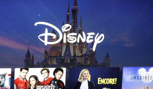 A Disney logo forms part of a menu for the Disney Plus movie and entertainment streaming service on a computer screen in Walpole, Mass, Nov. 13, 2019. Walt Disney&#x27;s moved to a loss in its second quarter, hampered by significantly higher restructuring and impairment charges, but its streaming business was profitable and theme parks continued to be a strength. While The Walt Disney Co. said Tuesday, May 7, 2024, that it foresees its streaming business softening in the third quarter due to Disney+Hotstar, it expects its combined streaming businesses to be profitable in the fourth quarter and to be a meaningful future growth driver for the company, with further improvements in profitability in fiscal 2025. (AP Photo/Steven Senne, File)