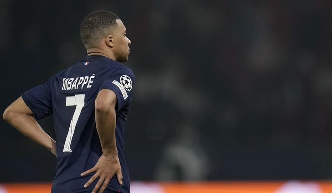 PSG&#x27;s Kylian Mbappe reacts after the Champions League semifinal second leg soccer match between Paris Saint-Germain and Borussia Dortmund at the Parc des Princes stadium in Paris, France, Tuesday, May 7, 2024. (AP Photo/Christophe Ena)