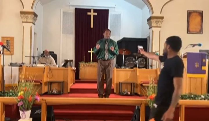 In this image taken from video, a Bernard J. Polite, 26, tries to shoot Pastor Glenn Germany, center, at the Jesus Dwelling Place church in North Braddock, Pa., May 5, 2024. The attempted shooting failed when Polite&#x27;s gun didn&#x27;t fire and was tackled by a congregant. (Glenn Germany via AP)
