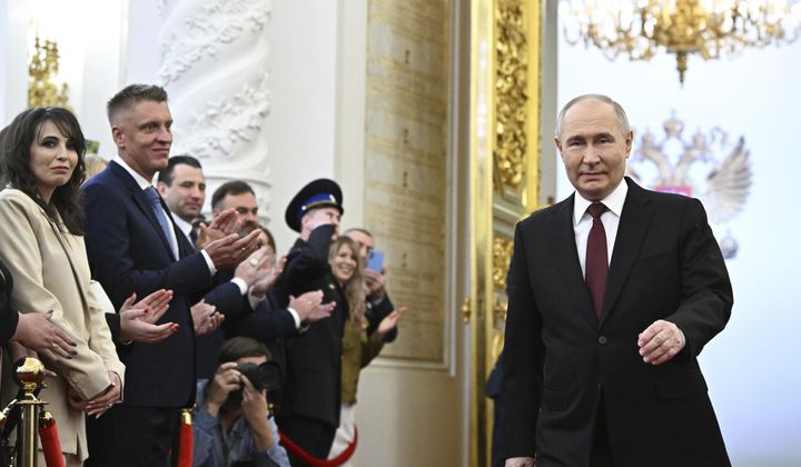 Vladimir Putin arrives for an inauguration ceremony to begin his fifth term as Russian president in the Grand Kremlin Palace in Moscow, Russia, Tuesday, May 7, 2024. (Sergei Bobylev, Sputnik, Kremlin Pool Photo via AP)