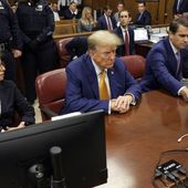 Former President Donald Trump, center, sits at the defense table with his attorneys Susan Necheles, from left, Todd Blanche and Emil Bove, in Manhattan criminal court, Tuesday, May 7, 2024, in New York. (Sarah Yenesel/Pool Photo via AP)
