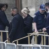 Stormy Daniels, center, exits the courthouse at Manhattan criminal court in New York, Tuesday, May 7, 2024. Porn actor Daniels, whose real name is Stephanie Clifford, took the stand mid-morning Tuesday and testified about her alleged sexual encounter with former President Donald Trump in 2006, among other things. (AP Photo/Seth Wenig)