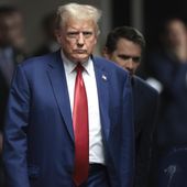 Former President Donald Trump walks to speak to reporters at Manhattan criminal court, Monday, May 6, 2024 in New York. (Win McNamee/Pool Photo via AP)