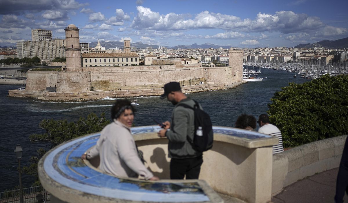 NextImg:The Olympic torch is being welcomed in French port city of Marseille with fanfare and high security