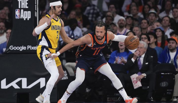 Indiana Pacers&#x27; Andrew Nembhard (2) defends against New York Knicks&#x27; Jalen Brunson (11) during the first half of Game 2 in an NBA basketball second-round playoff series Wednesday, May 8, 2024, in New York. (AP Photo/Frank Franklin II)