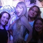 In this image taken from video, fans pose with a life-size image of Taylor Swift at a club that plays only Swift&#x27;s music in Gothenburg, Sweden, on Tuesday, April 30th, 2024. Swift is scheduled to kick off the 18-city Europe leg of her record-setting Eras Tour on Thursday, May 9, 2024. There will be three shows in Stockholm. (AP Photo/Chisato Tanaka)