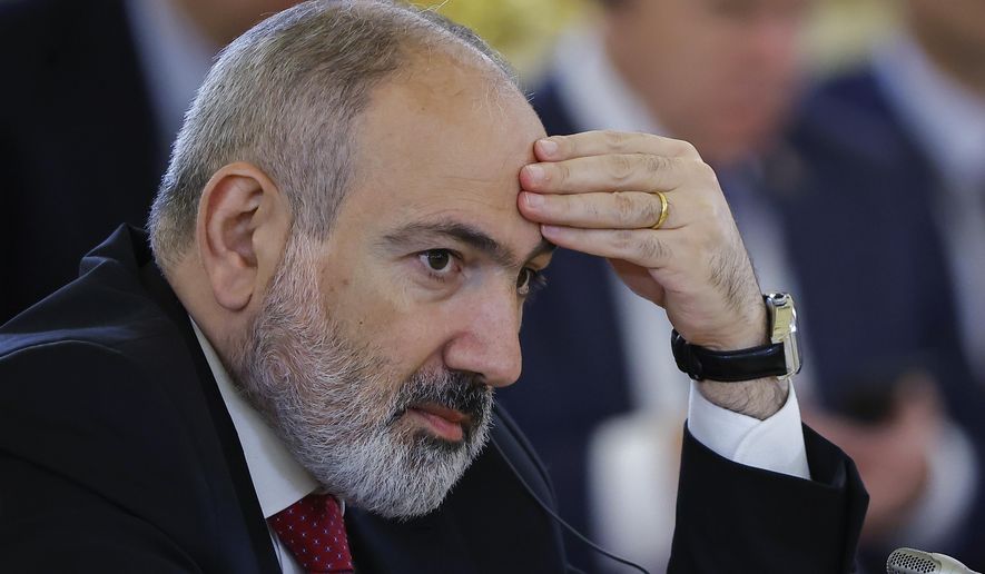 Armenian Prime Minister Nikol Pashinyan attends a meeting of the Supreme Eurasian Economic Council of the Eurasian Economic Union at the Kremlin in Moscow, Russia, on Wednesday, May 8, 2024. Thousands of protesters gathered Thursday, May 9, 2024, in the Armenian capital, Yerevan, to demand the resignation of Prime Minister Nikol Pashinyan over his government's decision to hand over control of border villages to Armenia's long-time rival Azerbaijan. (Evgenia Novozhenina/Pool Photo via AP, File)