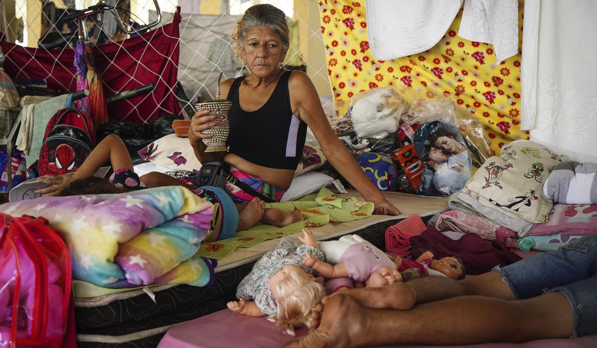 NextImg:More heavy rain expected in Brazil’s south, where many who remain are poor