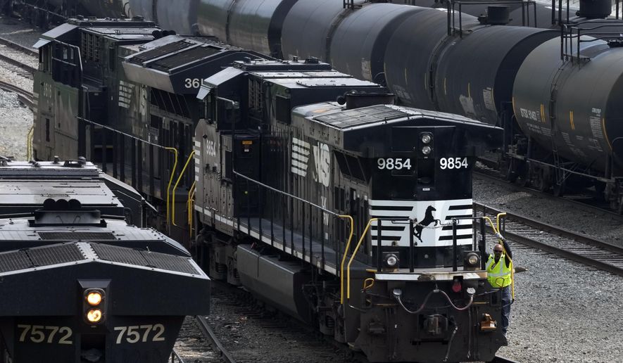 Norfolk Southern locomotives are moved through the Conway Terminal in Conway, Pa., June 17, 2023. Norfolk Southern shareholders will decide Thursday, May 9, 2024, whether to back an activist investor’s bid to take over the railroad’s board and replace management. (AP Photo/Gene J. Puskar, File)