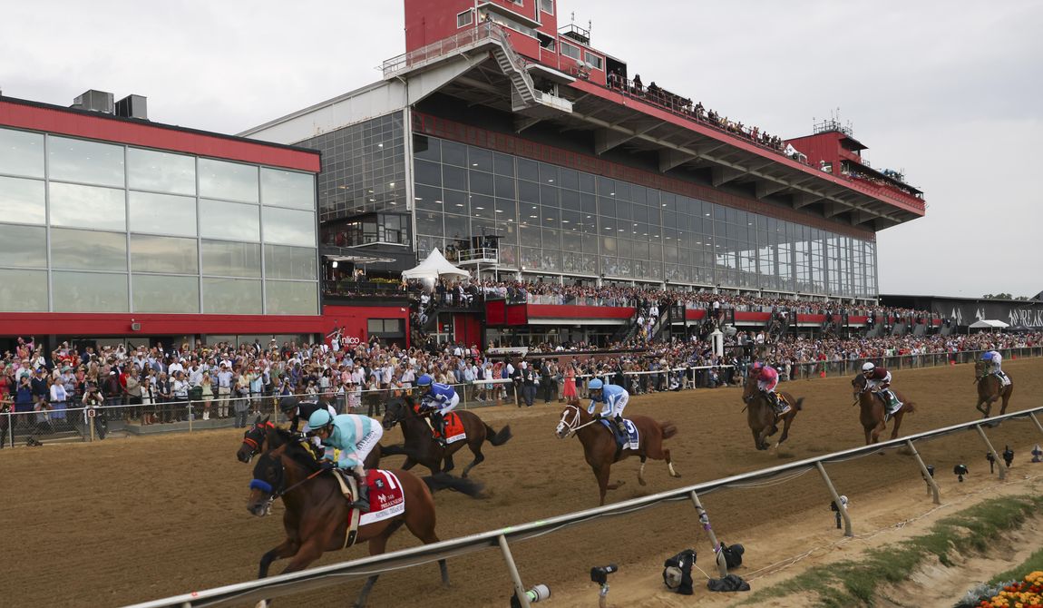FILE - National Treasure, bottom left, with John Velazquez, leads the pack toward the first turn during the148th running of the Preakness Stakes horse race at Pimlico Race Course, May 20, 2023, in Baltimore. Maryland Gov. Wes Moore signed a measure on Thursday, May 9, 2024, to rebuild Baltimore’s historic but antiquated Pimlico Race Course and transfer the track to state control. (AP Photo/Julia Nikhinson, File)