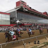 FILE - National Treasure, bottom left, with John Velazquez, leads the pack toward the first turn during the148th running of the Preakness Stakes horse race at Pimlico Race Course, May 20, 2023, in Baltimore. Maryland Gov. Wes Moore signed a measure on Thursday, May 9, 2024, to rebuild Baltimore’s historic but antiquated Pimlico Race Course and transfer the track to state control. (AP Photo/Julia Nikhinson, File)