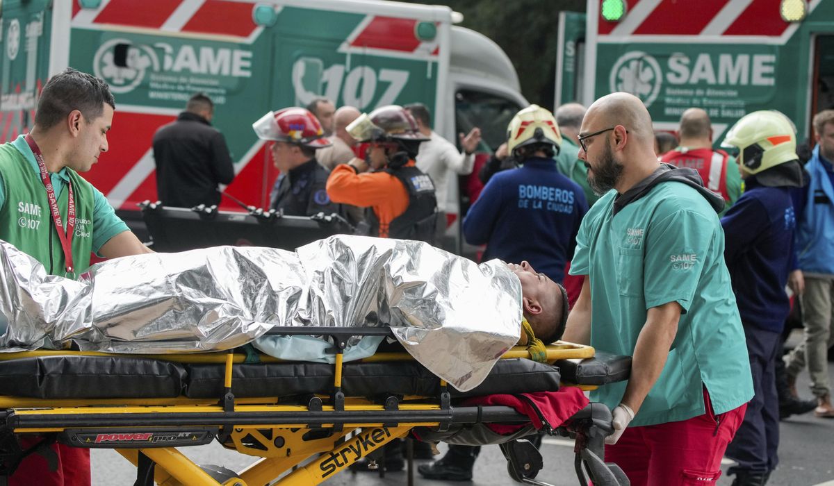 NextImg:A train in central Buenos Aires strikes a boxcar on the track, injuring dozens