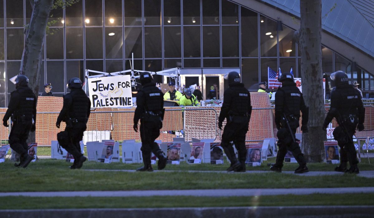 NextImg:Police dismantle pro-Palestinian encampment at MIT and move to clear Penn and Arizona protests