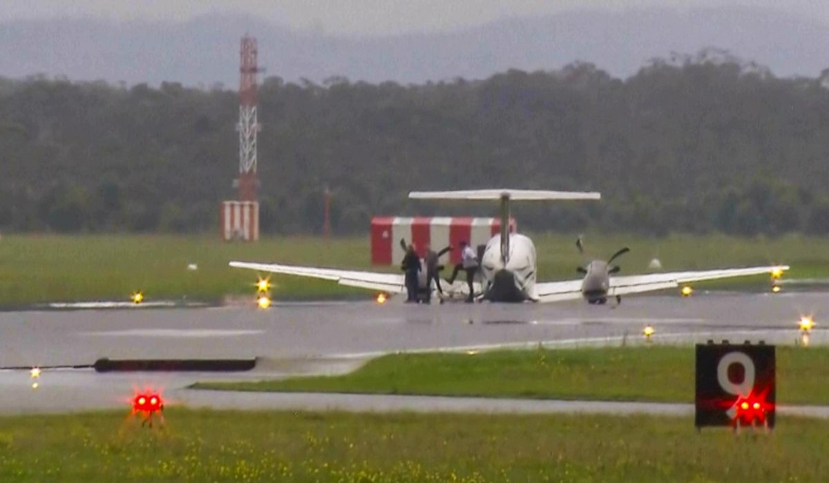 NextImg:A plane with 3 aboard lands without landing gear at an Australian airport after burning off fuel