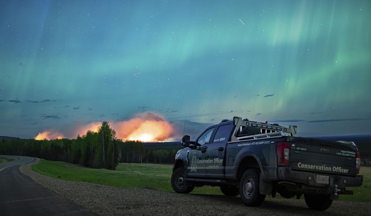 NextImg:Town prepares for possible ‘last stand’ as wildfires rage in Western Canada