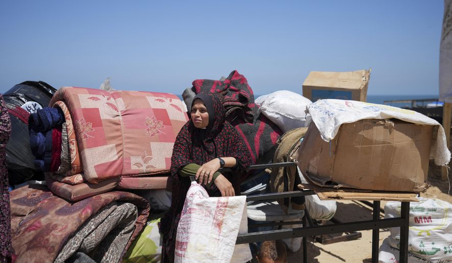 Displaced Palestinians arrive in central Gaza after fleeing from the southern Gaza city of Rafah in Deir al Balah, Gaza Strip, on Thursday, May 9, 2024. Palestinians on Wednesday, May 15, 2024, will mark the 76th year of their mass expulsion from what is now Israel. It’s an event that is at the core of their national struggle, but in many ways pales in comparison to the calamity now unfolding in Gaza. (AP Photo/Abdel Kareem Hana)