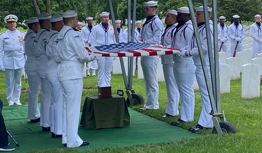 U.S. Navy veteran Frank Hryniewicz was buried with full military honors Thursday at Arlington National Cemetery. (Mike Glenn/The Washington Times)
