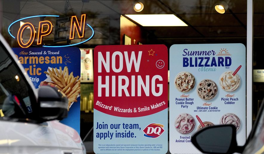 A hiring sign is displayed at a restaurant in Northbrook, Ill., Thursday, May 2, 2024. On Thursday, May 16, 2024, the Labor Department reports on the number of people who applied for unemployment benefits last week. (AP Photo/Nam Y. Huh)