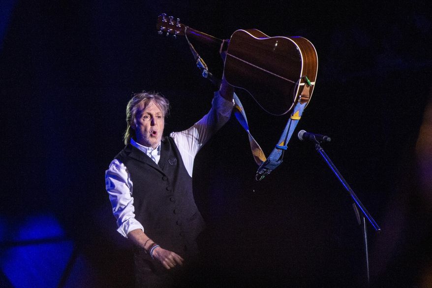 Paul McCartney performs at the Glastonbury Festival in Worthy Farm, Somerset, England, on Saturday, June 25, 2022. Paul McCartney is a billionaire Beatle. The former member of the Fab Four is the first British musician to be worth 1 billion pounds ($1.27 billion), according to figures released Friday, May 17, 2024. (Joel C Ryan/Invision/AP, File)