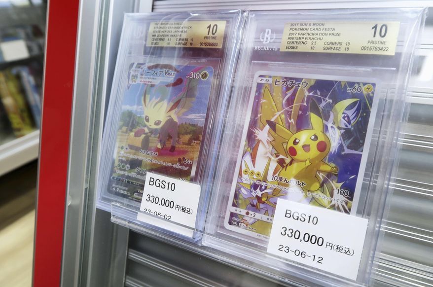 Pokemon cards are on display for sale at a shop in Tokyo, June 19, 2023. A senior member of yakuza was arrested for allegedly stealing Pokemon cards near Tokyo in April 2024, a case seen as an example of Japanese organized crime groups struggling with declining membership. (Kyodo News via AP)
