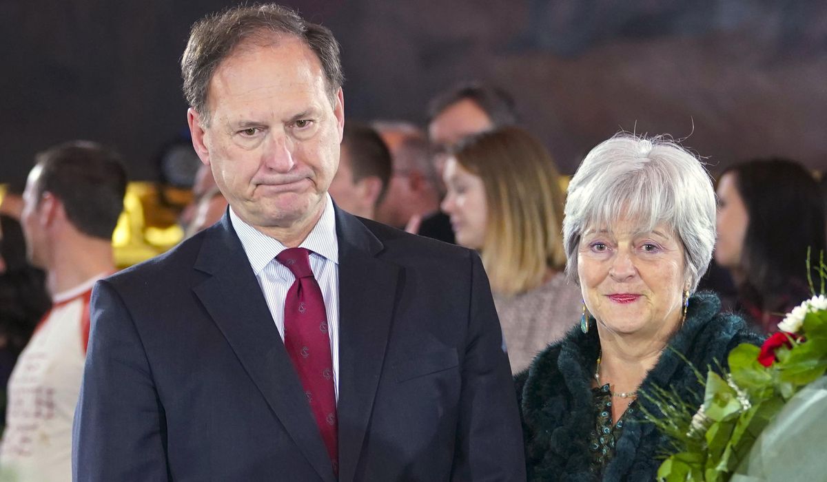 NextImg:Second flag carried by Jan. 6 rioters displayed outside house owned by Justice Alito, report says