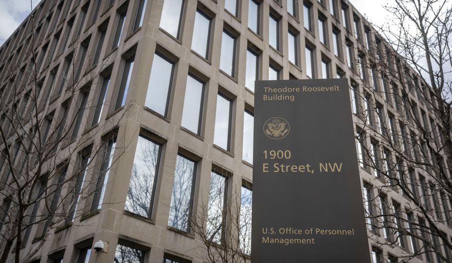 The Theodore Roosevelt Building, location of the U.S. Office of Personnel Management, is pictured on Feb. 13, 2024, in Washington. In a city that revolves around the federal government, the annual Best Places to Work survey is a closely-watched annual event worthy of bragging rights, provided you're one of the agencies like NASA or the Government Accountability Office who topped the survey. The survey, released Monday, May 20, uses information from the Office of Personnel Management's Federal Employee Viewpoint Survey. (AP Photo/Mark Schiefelbein, File)