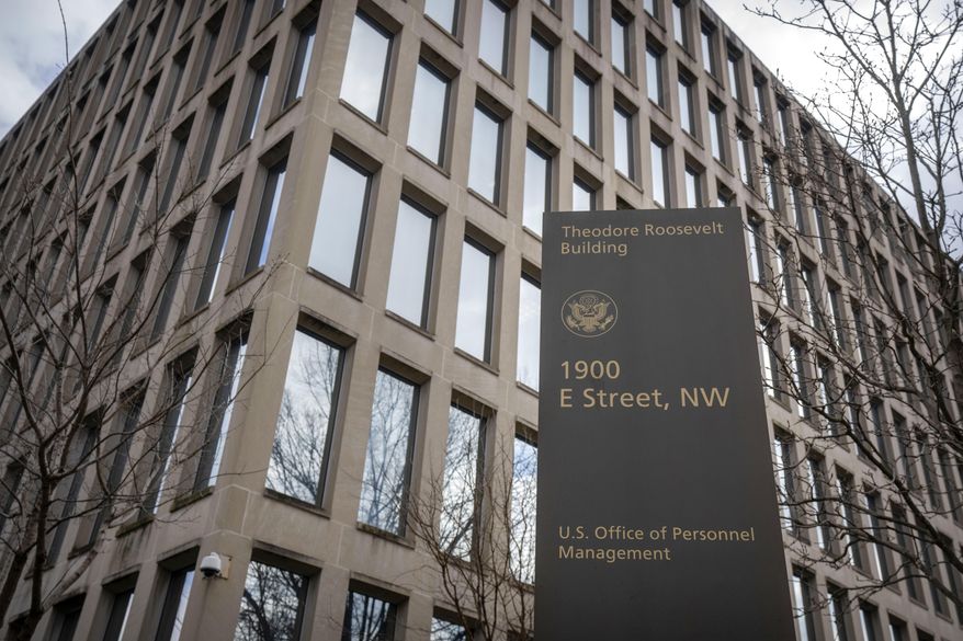 The Theodore Roosevelt Building, location of the U.S. Office of Personnel Management, is pictured on Feb. 13, 2024, in Washington. In a city that revolves around the federal government, the annual Best Places to Work survey is a closely-watched annual event worthy of bragging rights, provided you're one of the agencies like NASA or the Government Accountability Office who topped the survey. The survey, released Monday, May 20, uses information from the Office of Personnel Management's Federal Employee Viewpoint Survey. (AP Photo/Mark Schiefelbein, File)