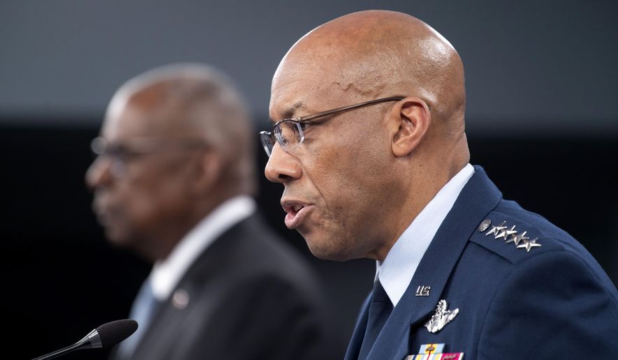 Chairman of the Joint Chiefs Of Staff Gen. Charles Q. Brown, Jr., right, speaks during a press briefing at the Pentagon with Defense Secretary Lloyd Austin on Monday, May 20, 2024 in Washington. (AP Photo/Kevin Wolf)