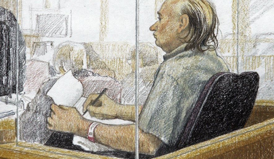 This artist's sketch shows accused serial killer Robert Pickton taking notes during the second day of his trial in B.C. Supreme Court in New Westminster, British Columbia, Jan. 31, 2006. Convicted Canadian serial killer Pickton has been hospitalized and is in a life-threatening condition after an assault at a Quebec prison, authorities said Tuesday, May 21, 2024. (Jane Wolsack/The Canadian Press via AP)