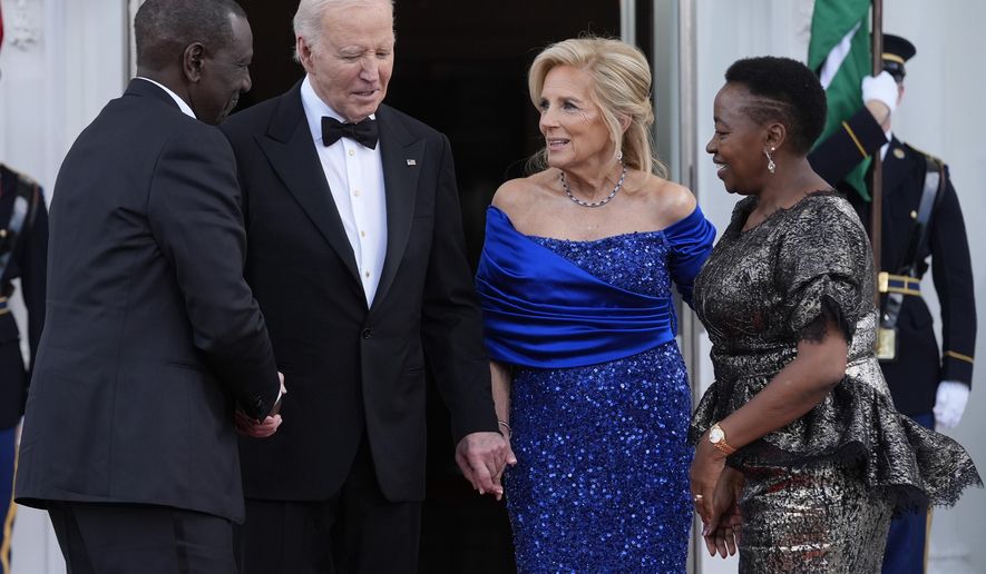 President Joe Biden and first lady Jill Biden welcome Kenya's President William Ruto and first lady Rachel Ruto to the White House in Washington for a State Dinner, Thursday, May 23, 2024. (AP Photo/Susan Walsh)