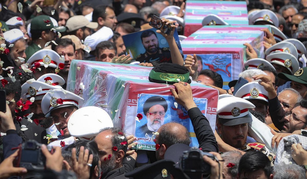NextImg:Iran begins burying late president, foreign minister and others killed in helicopter crash