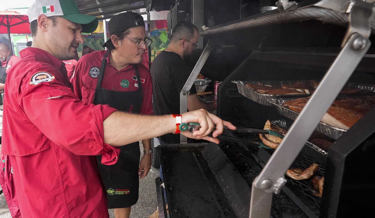 NextImg:At the ‘Super Bowl of Swine,’ global barbecuing traditions are the wood-smoked flavor of the day