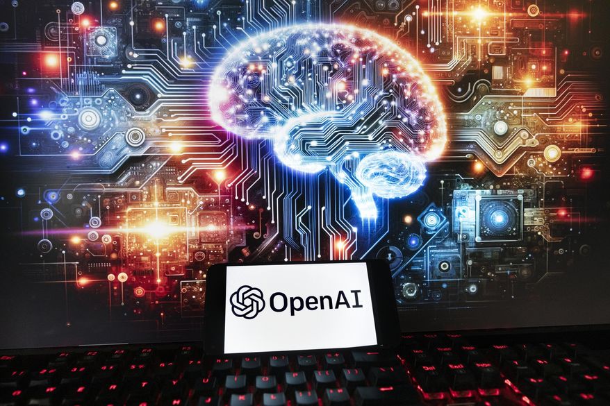 The OpenAI logo is seen displayed on a cell phone with an image on a computer monitor generated by ChatGPT's Dall-E text-to-image model, Friday, Dec. 8, 2023, in Boston. OpenAI will start using news content from News Corp. as part of a multiyear deal between the two companies. (AP Photo/Michael Dwyer, file)