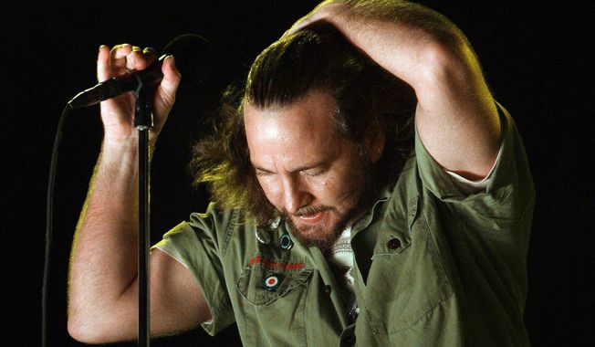 FILE - Pearl Jam lead singer Eddie Vedder performs at the Bonnaroo music festival in Manchester, Tenn., June 14, 2008. In 1994 Pearl Jam filed a complaint against Ticketmaster with the Justice Department, claiming that the company used its position in the industry to stop promoters from booking the band because they railed against Ticketmaster's pricing. (AP Photo/Mark Humphrey, File)