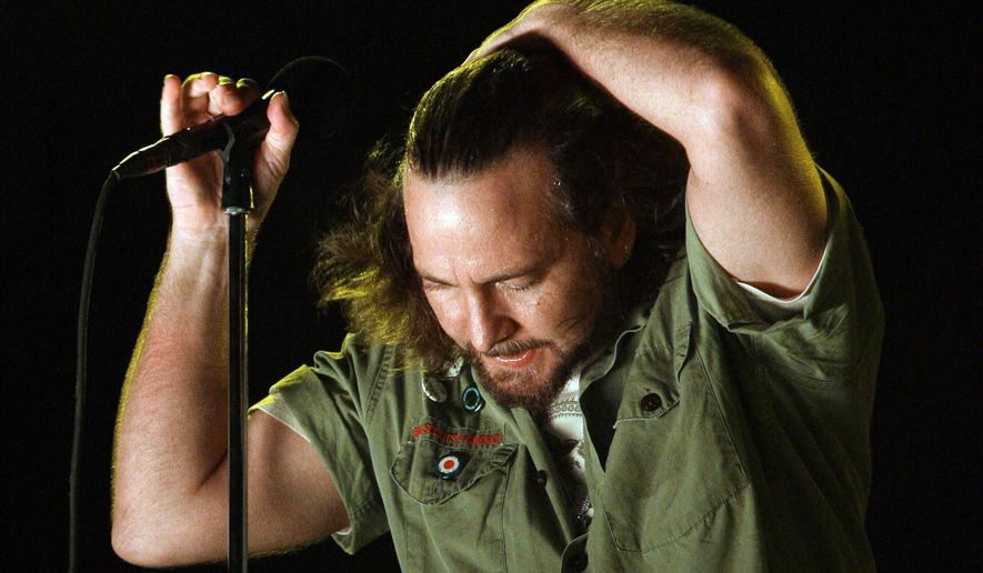 FILE - Pearl Jam lead singer Eddie Vedder performs at the Bonnaroo music festival in Manchester, Tenn., June 14, 2008. In 1994 Pearl Jam filed a complaint against Ticketmaster with the Justice Department, claiming that the company used its position in the industry to stop promoters from booking the band because they railed against Ticketmaster's pricing. (AP Photo/Mark Humphrey, File)
