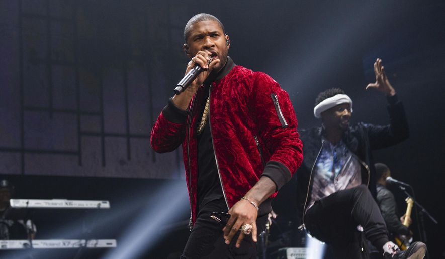 Usher performs at Power 105.1's Powerhouse 2016 at Barclays Center in New York on Oct. 27, 2016. He was added to the lineup for the Essence Festival of Culture, which runs July 4-7 in New Orleans. (Photo by Scott Roth/Invision/AP, File)