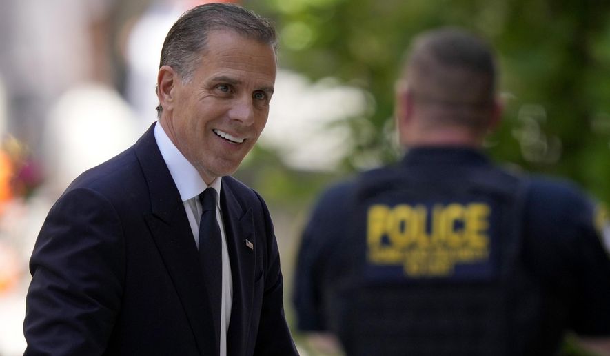 Hunter Biden arrives for a court appearance, Friday, May 24, 2024, in Wilmington, Del. (AP Photo/Matt Rourke)
