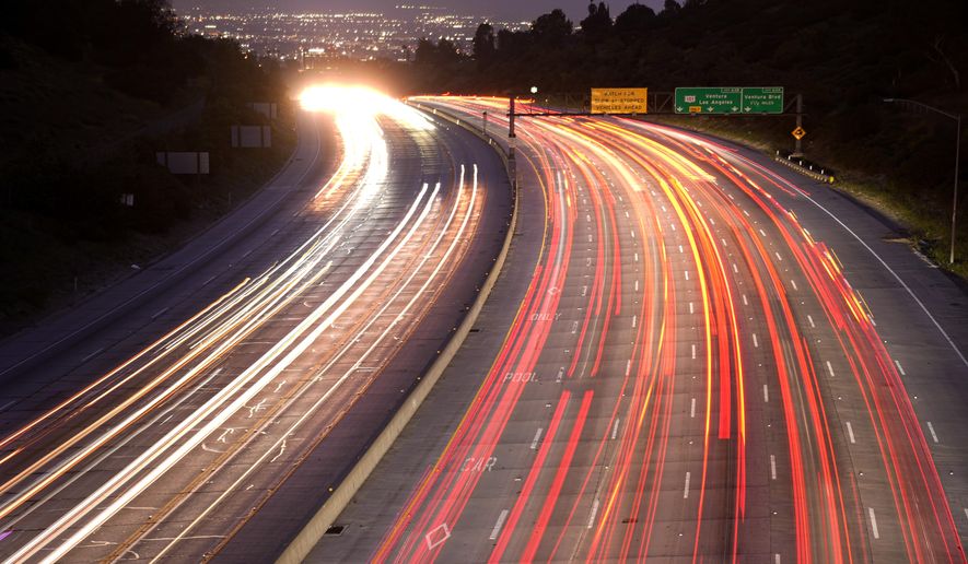 Traffic slowly moves along Interstate 405 on Thursday, May 23, 2024, in the Bel Air section of Los Angeles. Highways and airports are likely to be jammed in the coming days as Americans head out on and home from Memorial Day weekend getaways. (AP Photo/Mark J. Terrill)