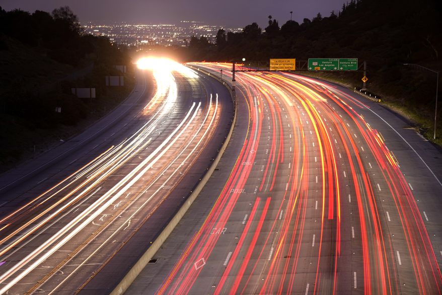 Traffic slowly moves along Interstate 405 on Thursday, May 23, 2024, in the Bel Air section of Los Angeles. Highways and airports are likely to be jammed in the coming days as Americans head out on and home from Memorial Day weekend getaways. (AP Photo/Mark J. Terrill)